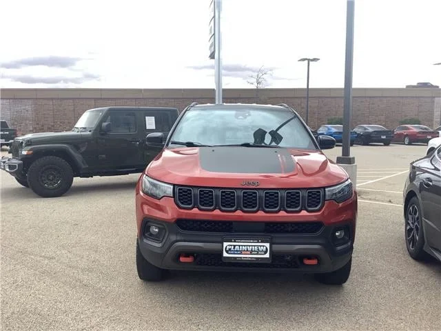 Used 2025 Red Hot Pearlcoat Jeep Trailhawk 4x4 image 3