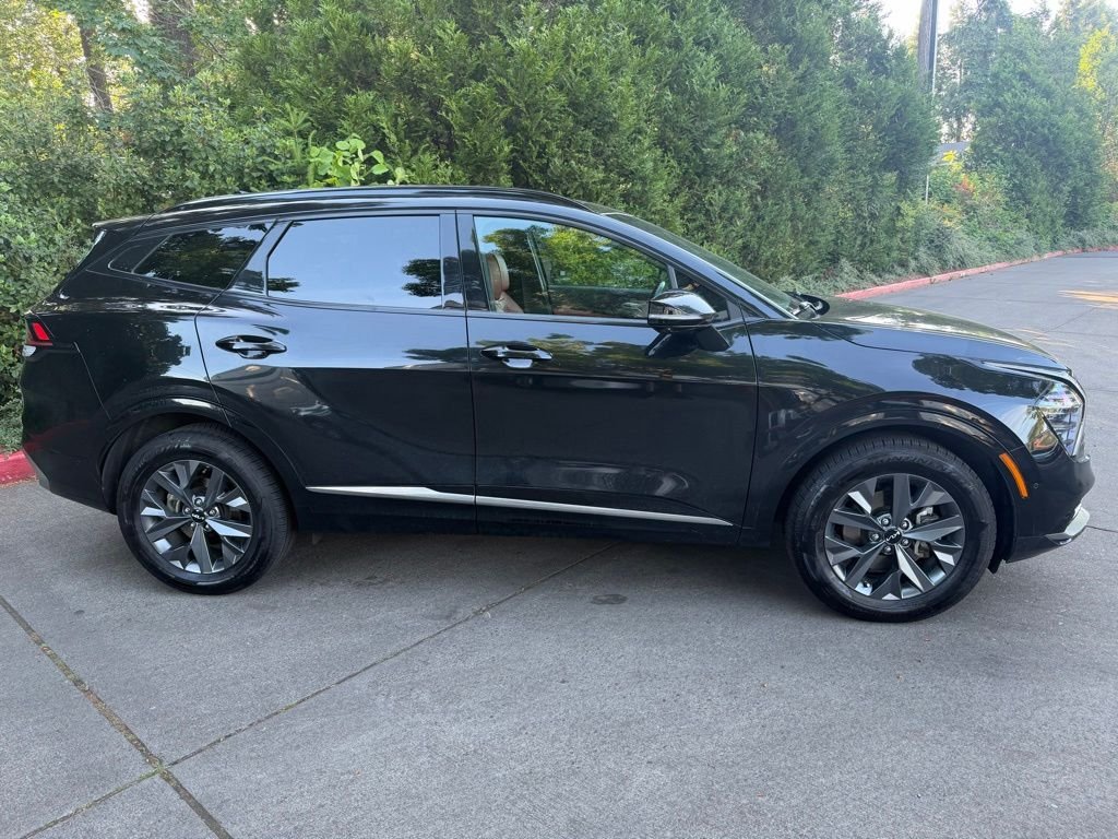 Used 2023 Fusion Black Kia SX-Prestige image 1