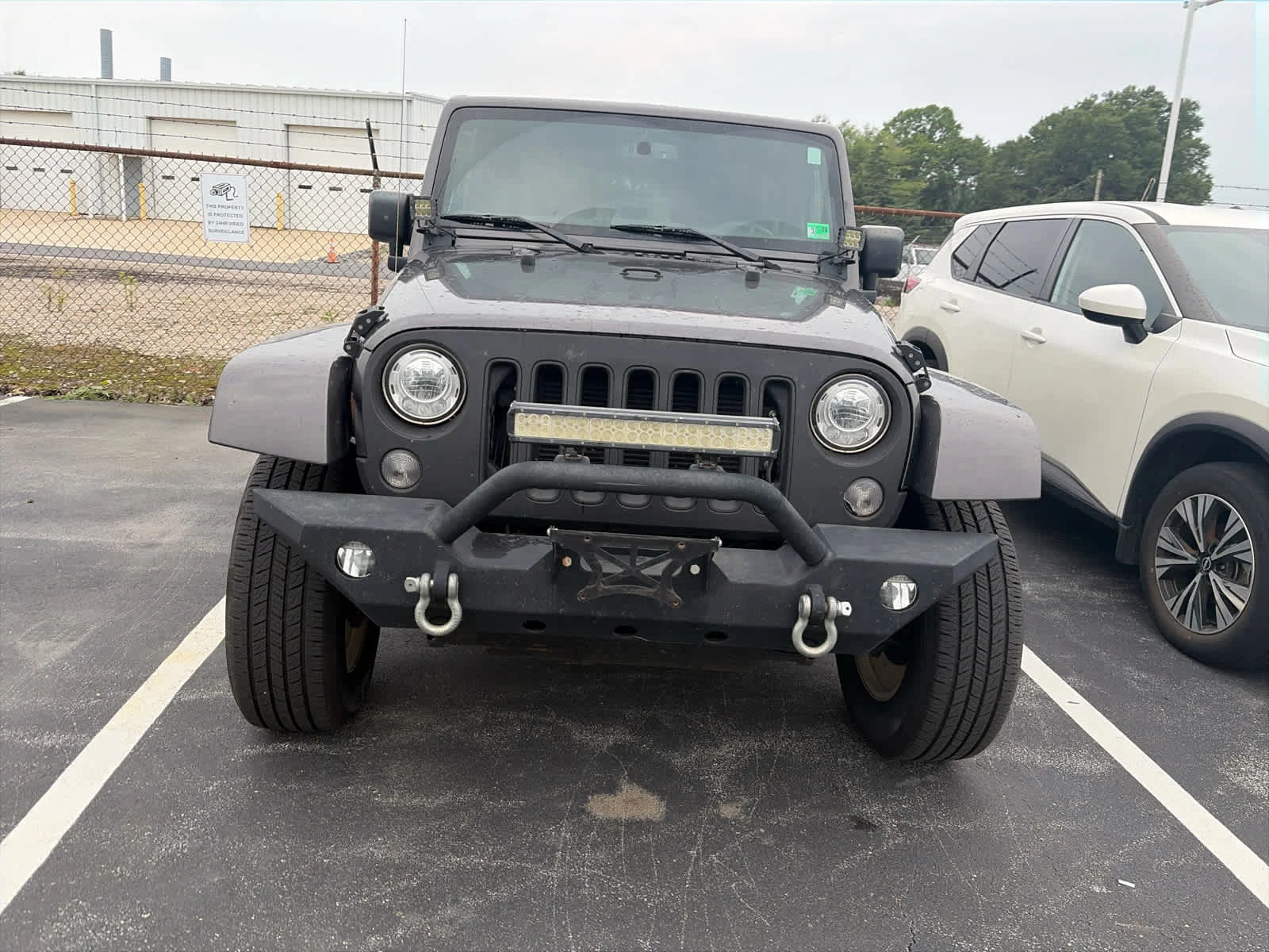 Used 2017 Granite Crystal Metallic Clearcoat Jeep Sahara image 2