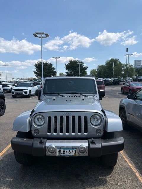 Used 2016 Jeep Wrangler Unlimited Sahara with VIN 1C4BJWEG9GL172583 for sale in Shakopee, Minnesota