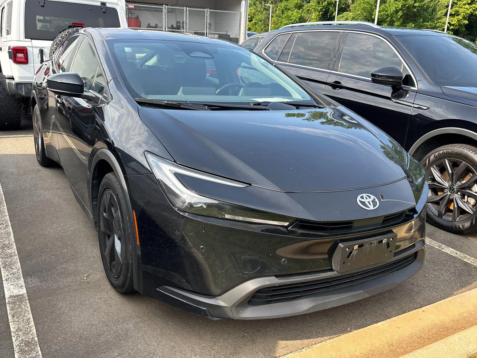 Used 2023 Midnight Black Metallic Toyota LE image 6