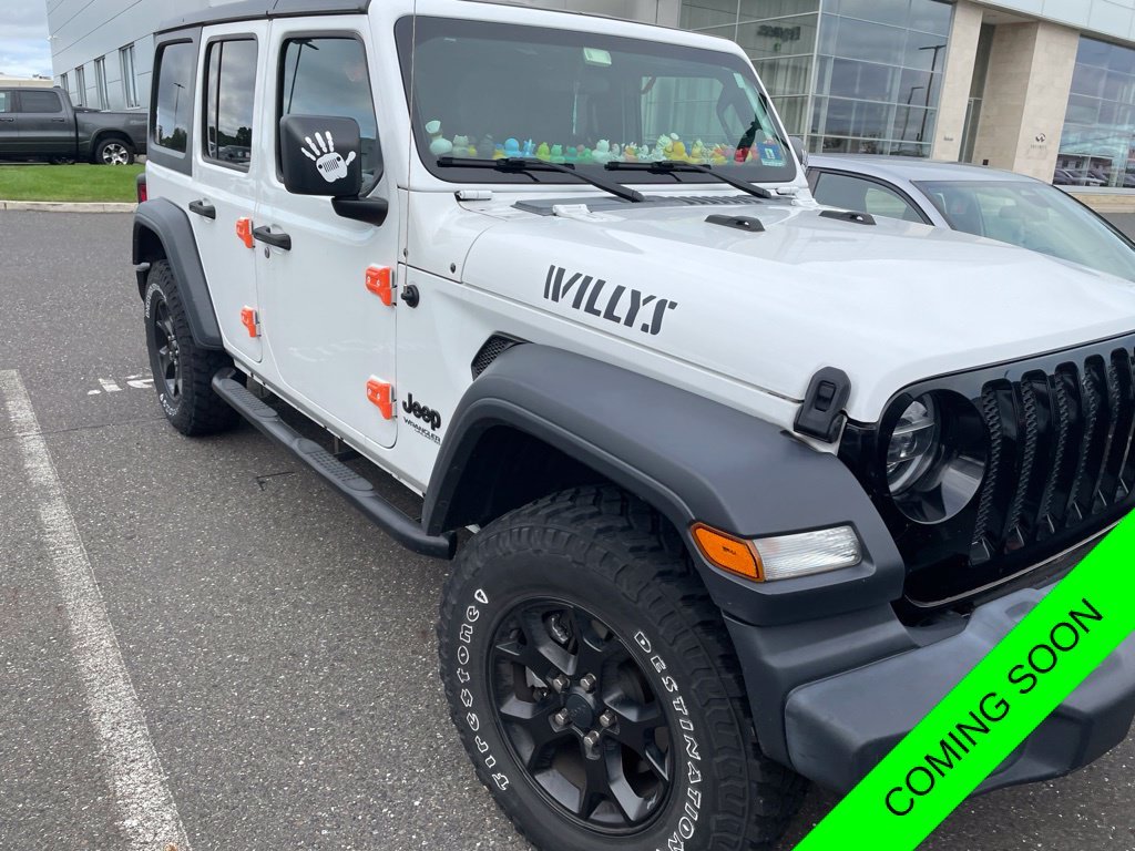 Used 2020 Bright White Clearcoat Jeep Unlimited Sport image 1