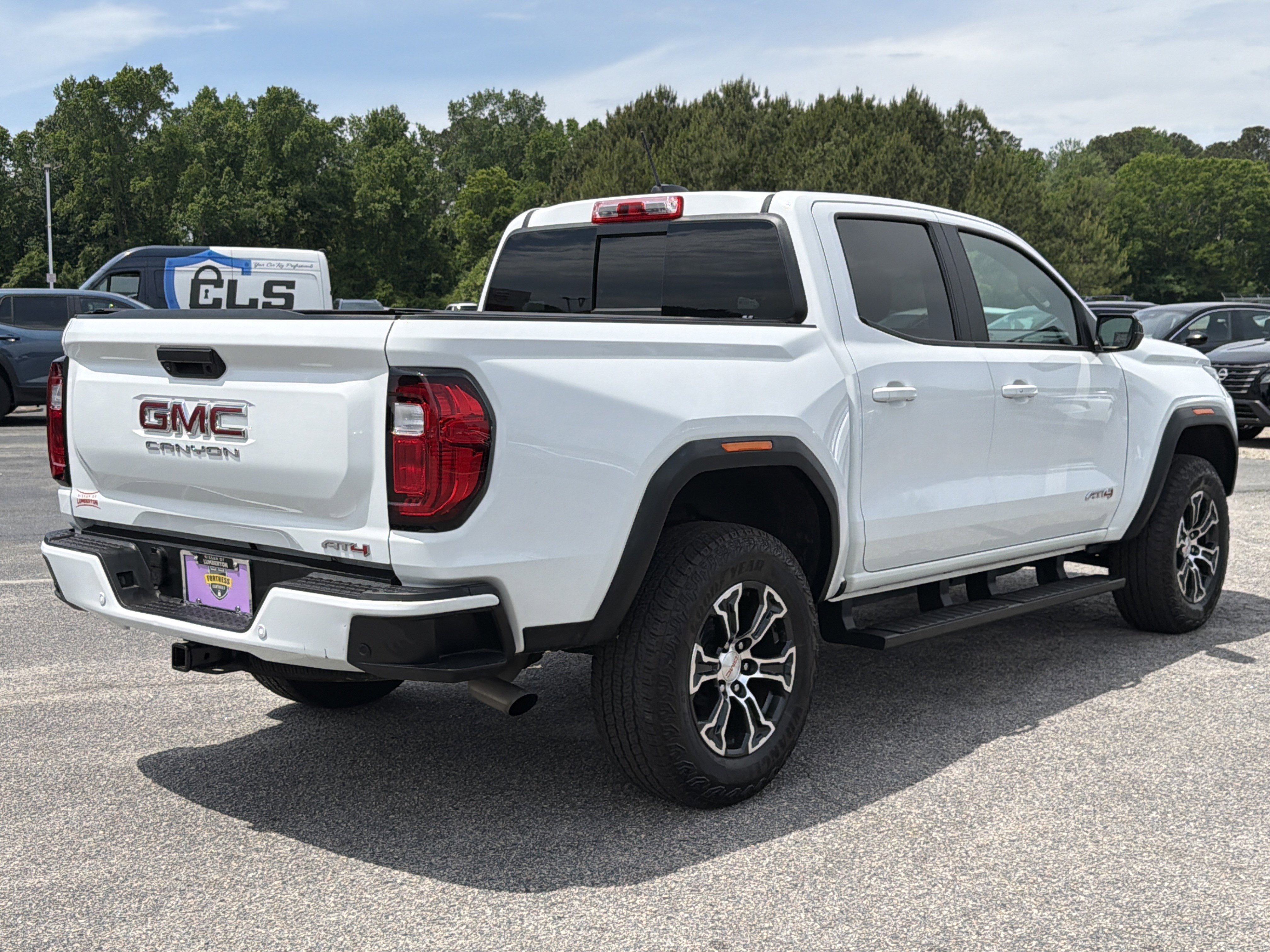 Used 2023 Summit White GMC 4WD AT4 image 30