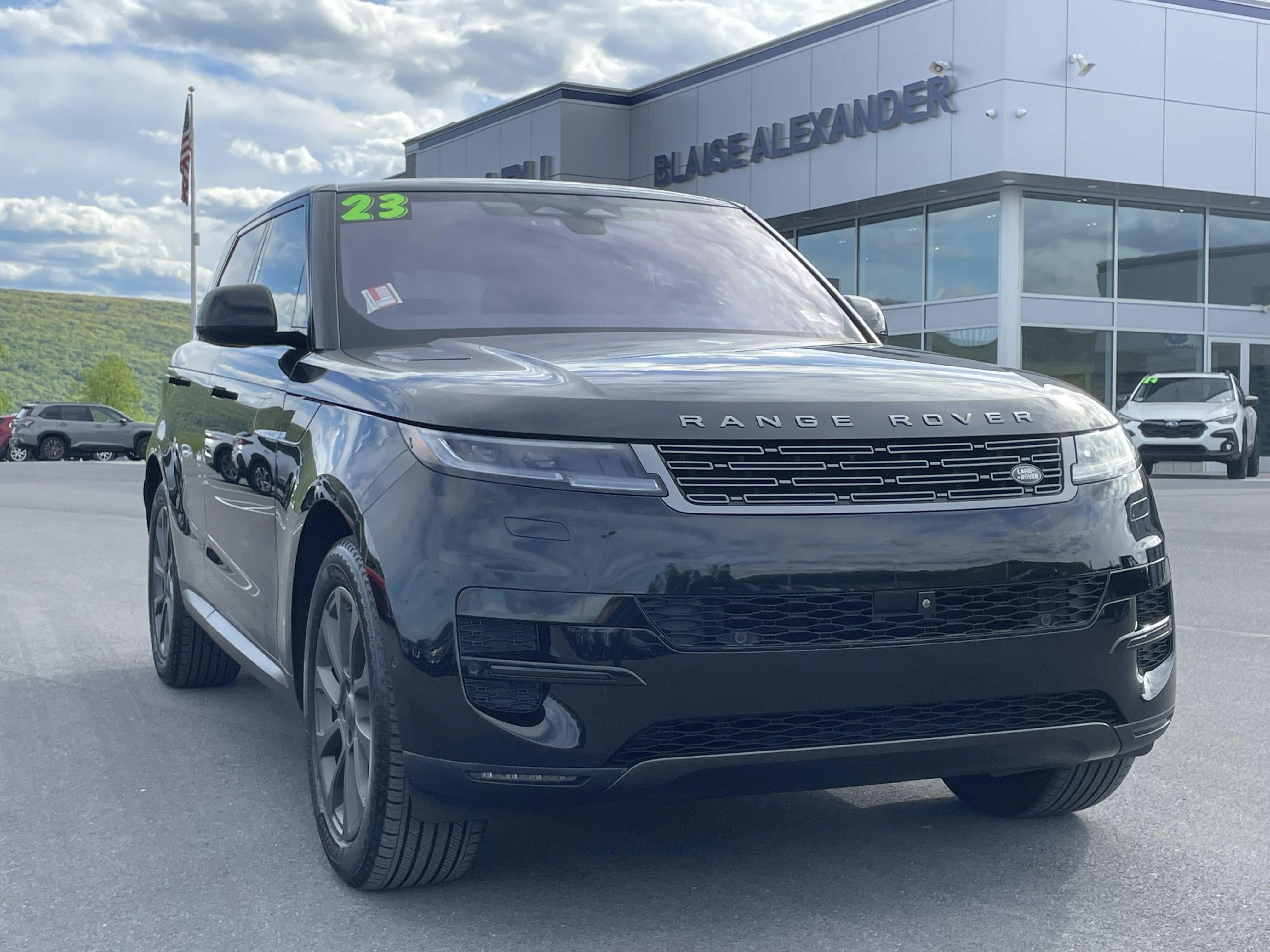 Used 2023 Santorini Black Metallic Land Rover SE image 1