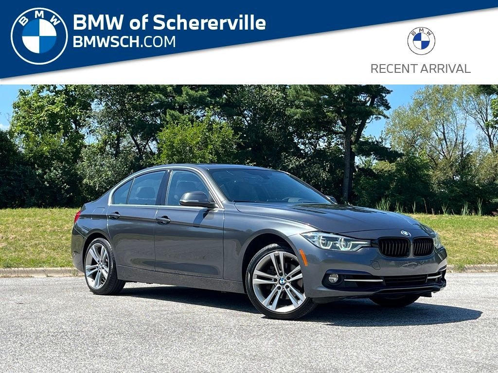 Used 2018 Mineral Grey Metallic BMW 330i xDrive image 1