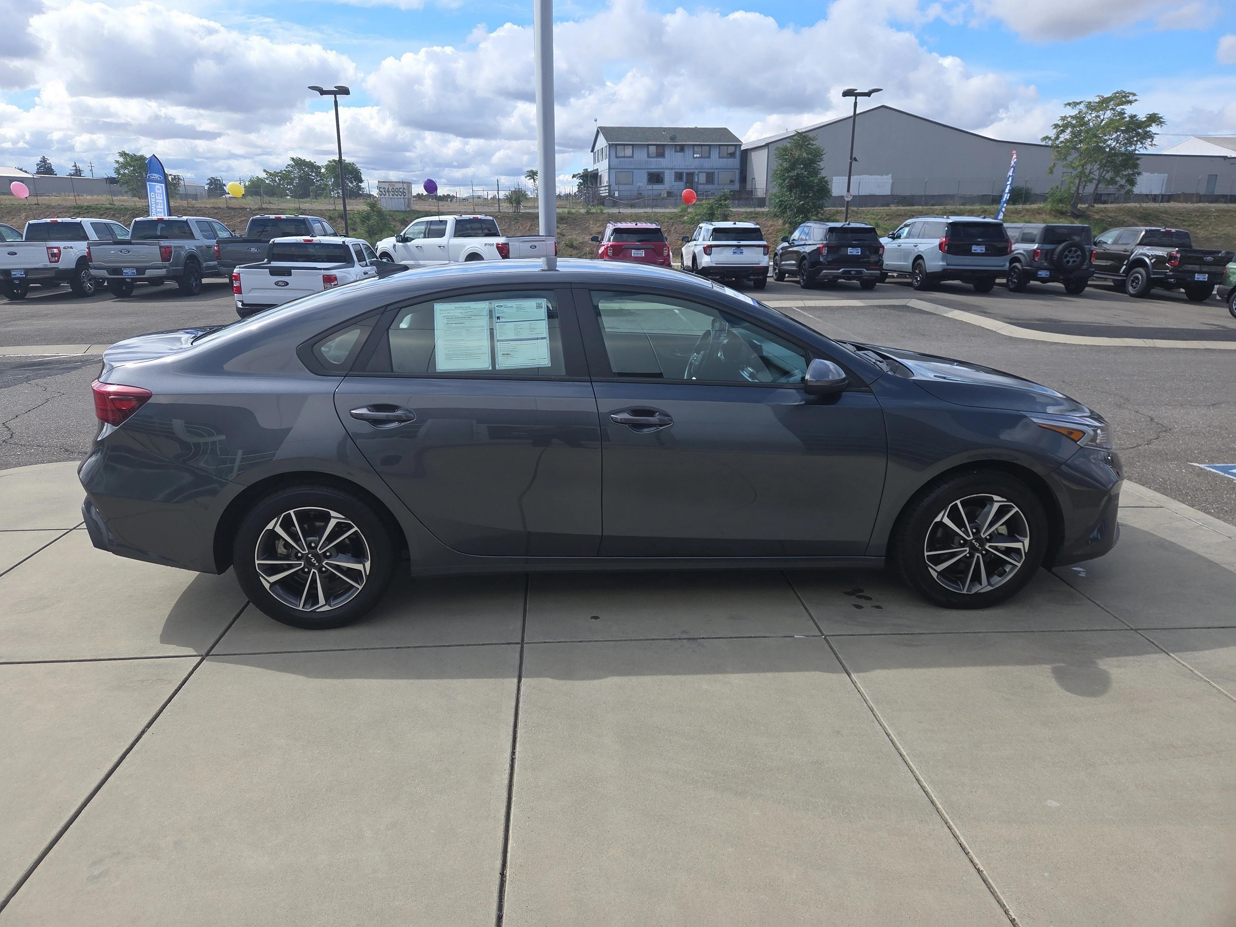 Used 2023 Gravity Gray Kia LXS image 6