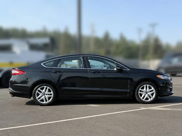 Used 2014 Tuxedo Black Metallic Ford SE image 9