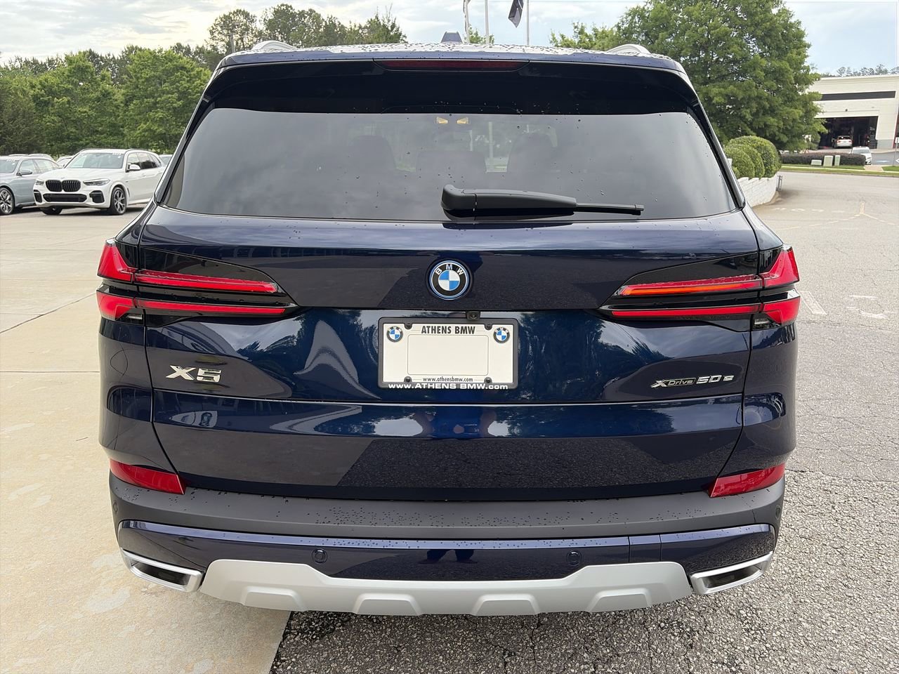 New 2026 Tanzanite Blue II Metallic BMW xDrive50e image 12