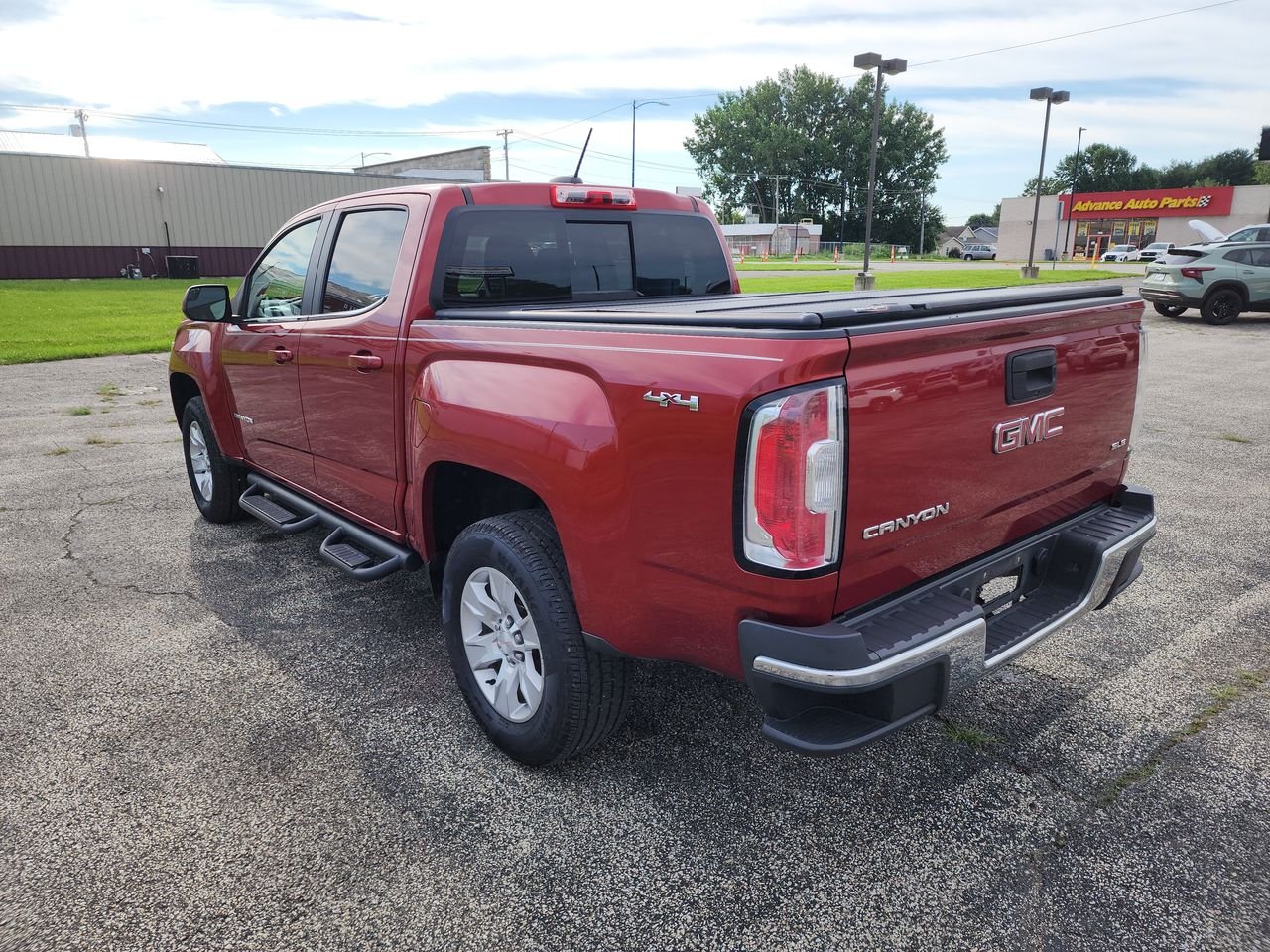 Used 2016 COPPER RED METALLIC GMC 4WD SLE image 6