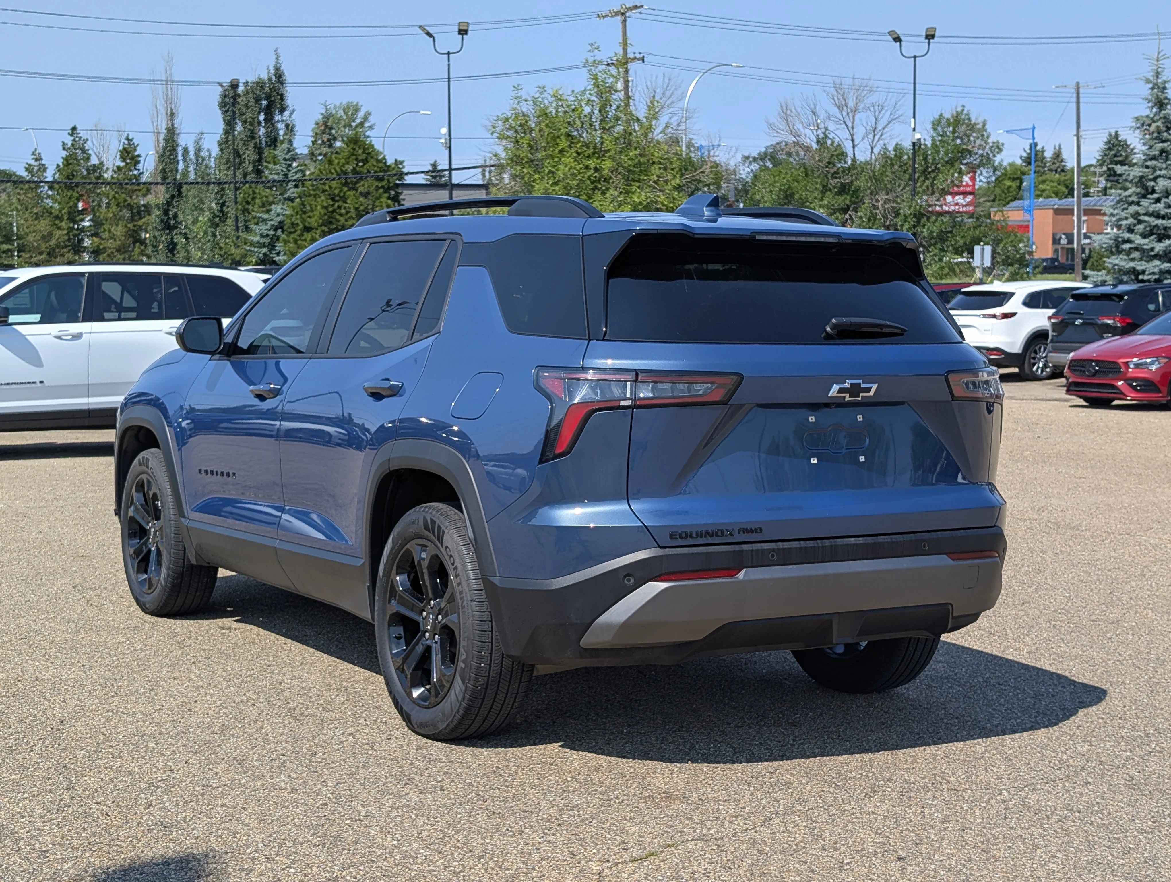 Used 2025 Lakeshore Blue Chevrolet AWD LT image 4