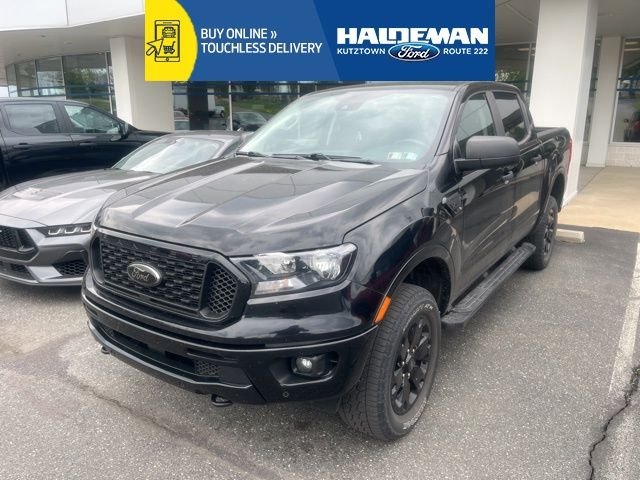 Used 2021 Shadow Black Ford XLT image 1