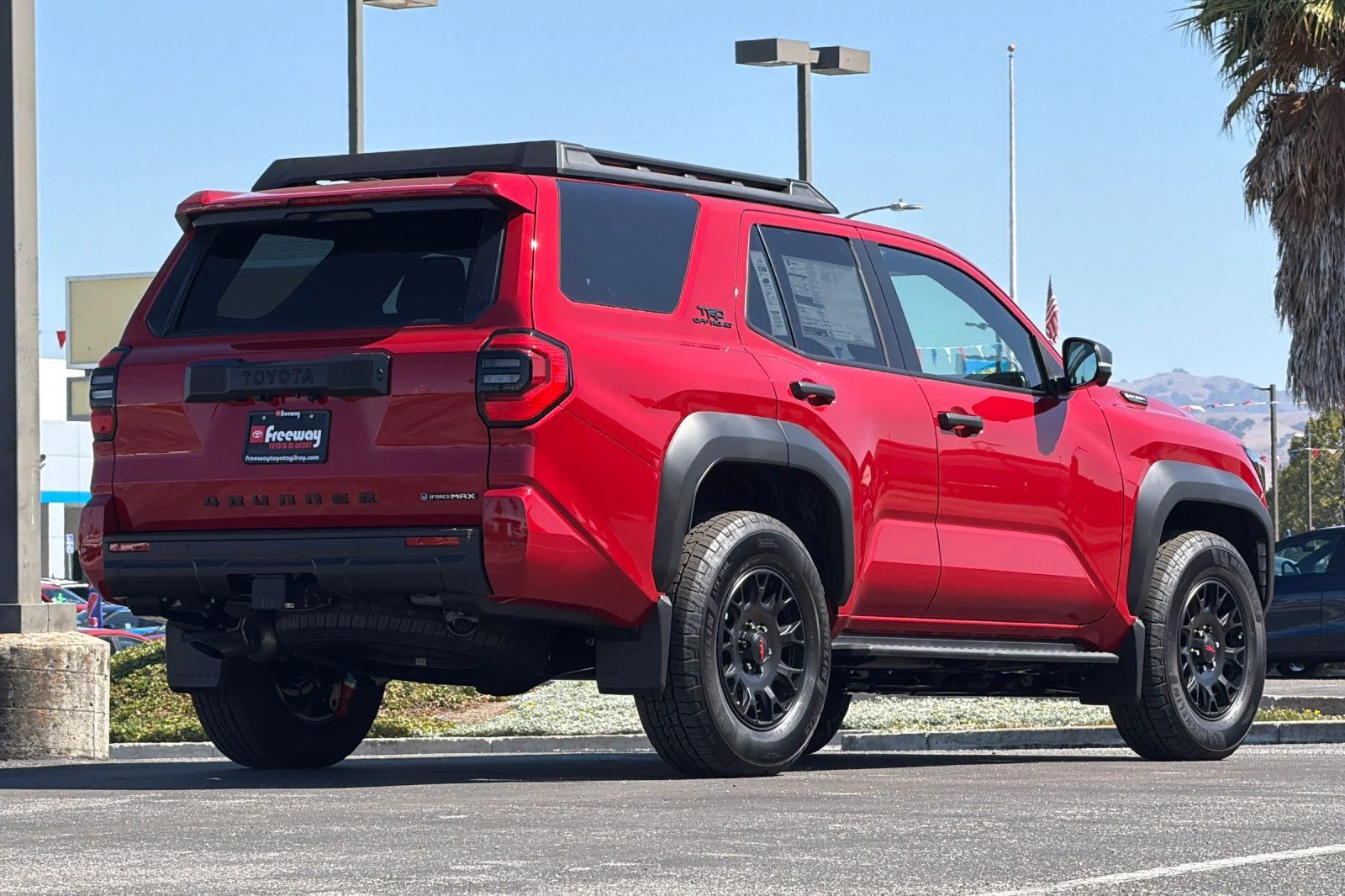 New 2026 Supersonic Red Toyota TRD Off-Road Premium i-FORCE MAX image 4