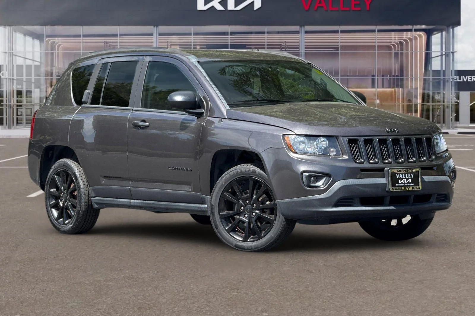 Used 2015 Jeep Compass Sport with VIN 1C4NJCBA1FD373110 for sale in Modesto, CA