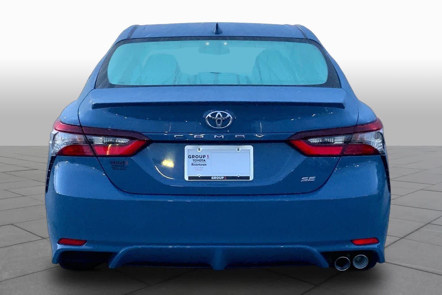 Used 2024 Cavalry Blue Toyota SE image 5