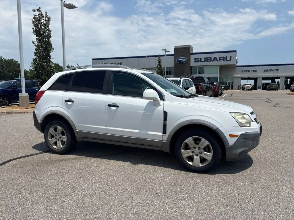 Used 2013 White Chevrolet 1LS image 1