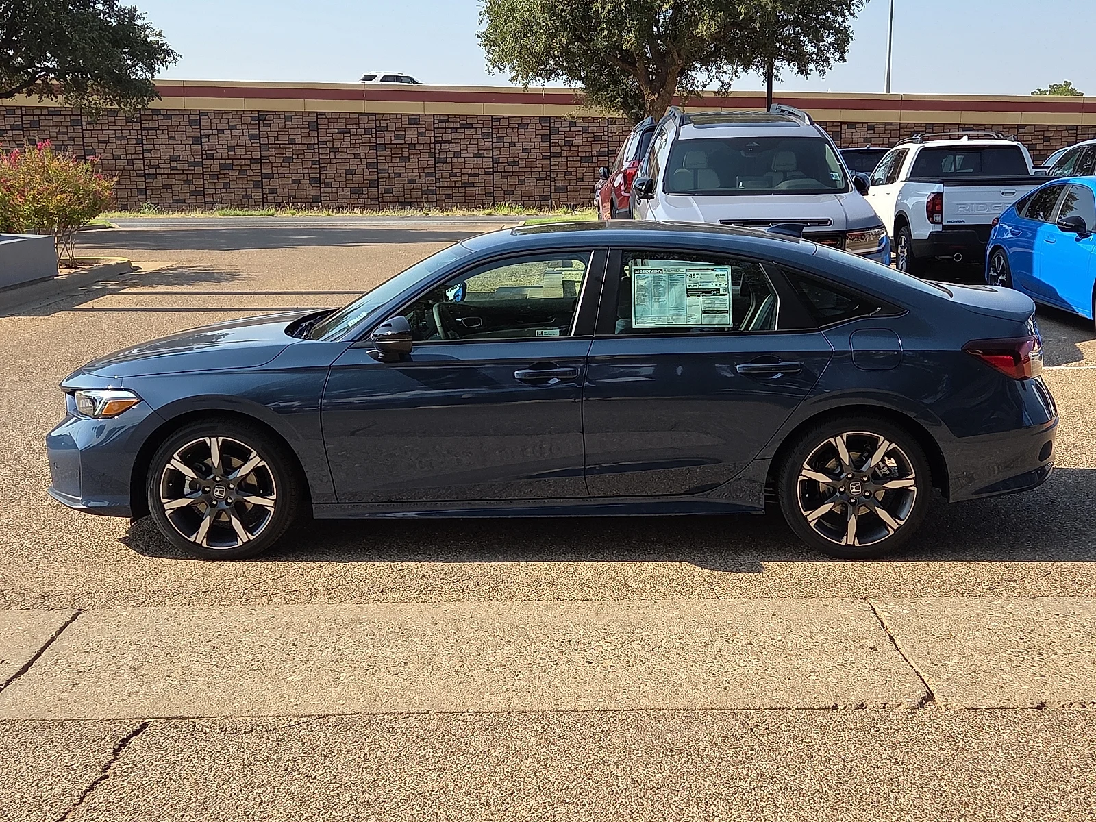 New 2026 Blue Lagoon Pearl Honda 2WD Sport Touring Hybrid image 2