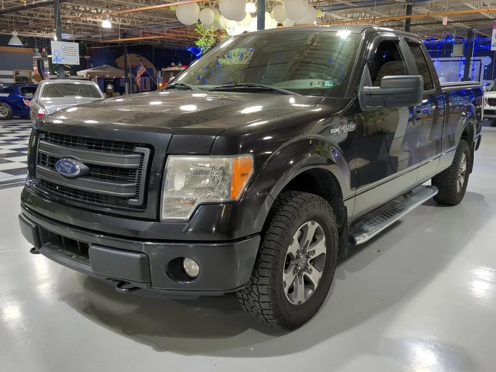 Used 2014 Tuxedo Black Metallic Ford STX image 1