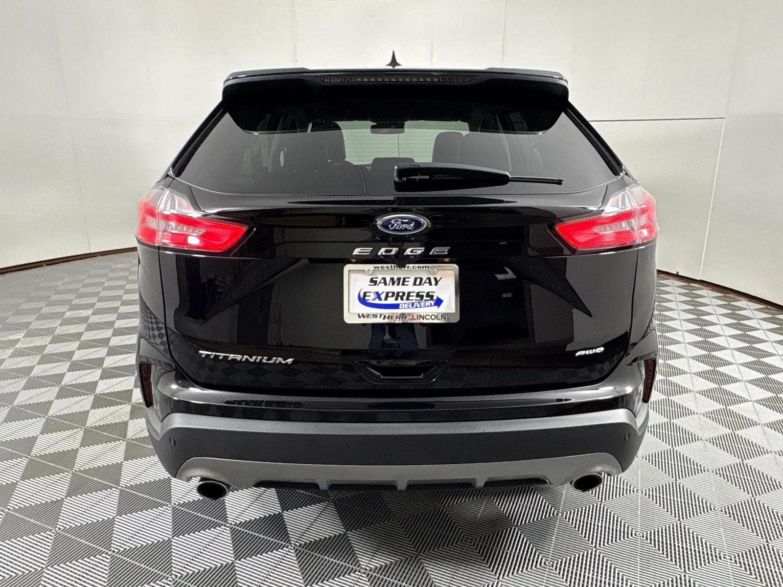Used 2024 Agate Black Metallic Ford Titanium image 18