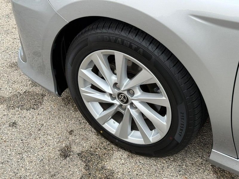 Used 2021 Celestial Silver Metallic Toyota LE image 10