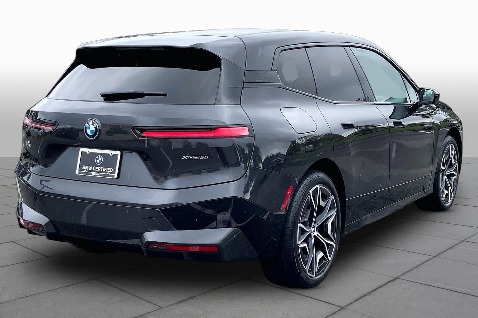 Used 2024 Dark Graphite Metallic BMW xDrive50 image 12