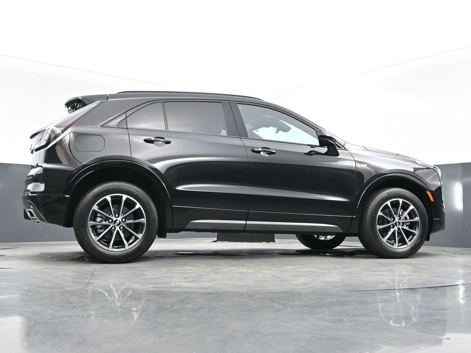 Used 2024 Stellar Black Metallic Cadillac Sport image 49