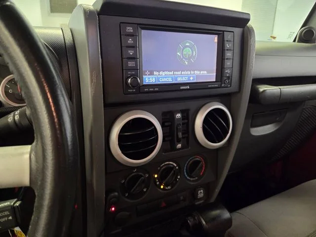 Used 2009 Orange Jeep Unlimited Sahara image 20