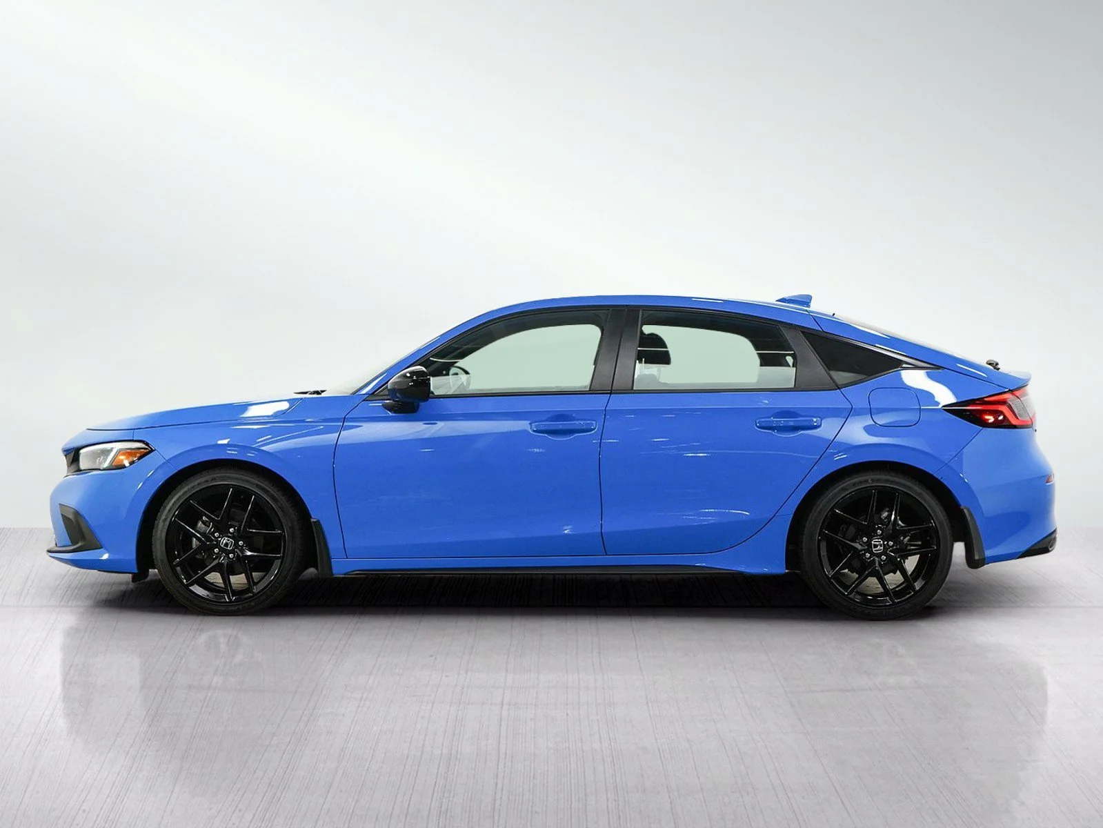 Used 2024 Honda Civic Hatchback Sport with VIN 19XFL2H86RE033628 for sale in Burnsville, Minnesota