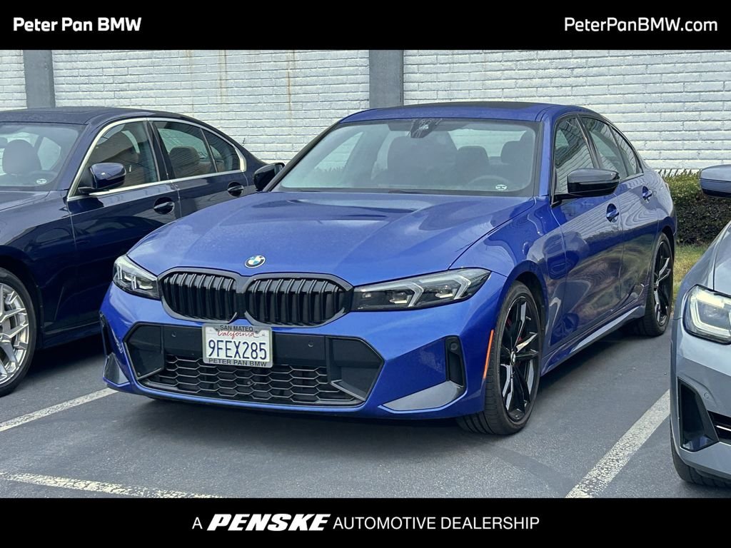 Certified Used 2023 Blue Metallic BMW 330i image 1