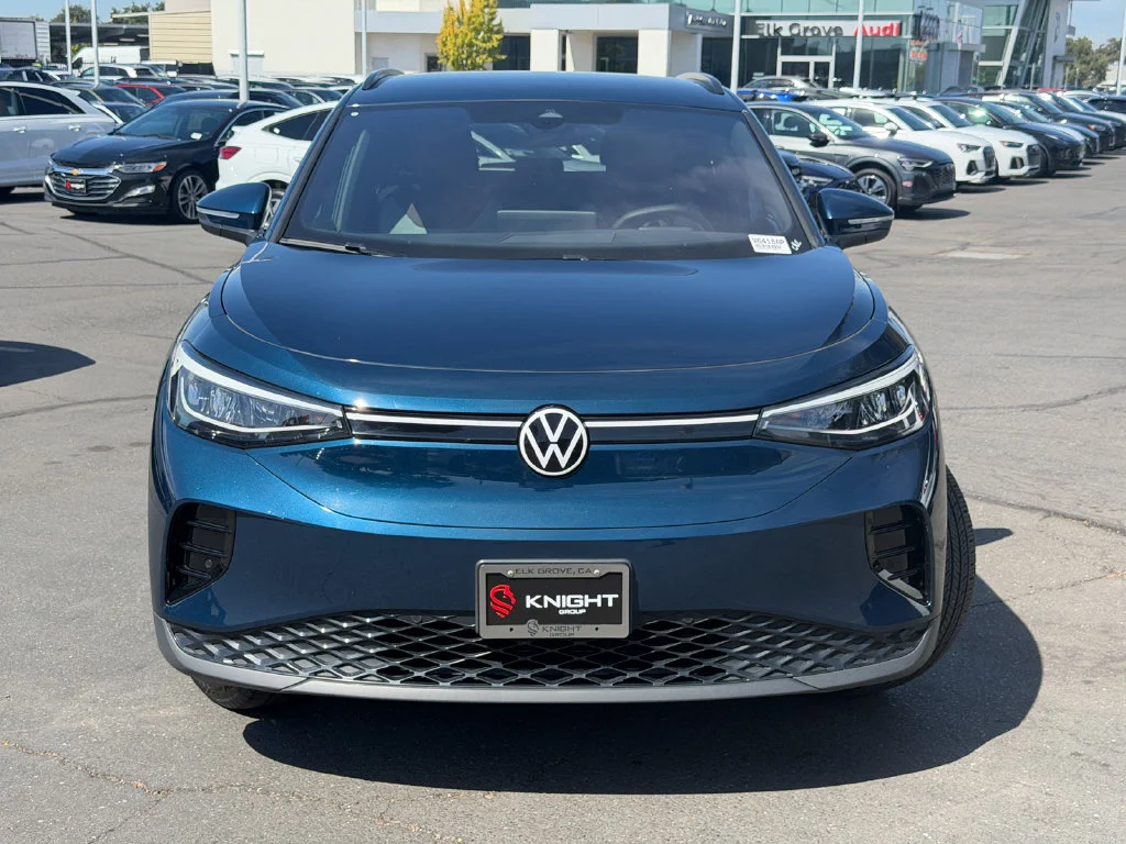 Used 2023 Tourmaline Blue Metallic w/Black Roof Volkswagen Pro image 3