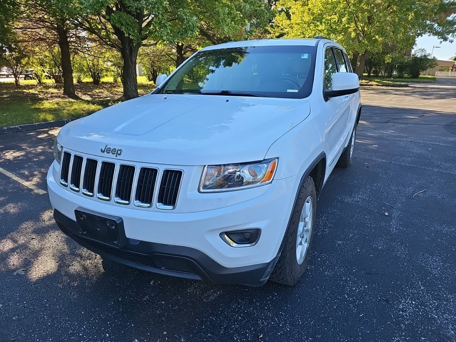 Used 2014 Jeep Grand Cherokee Laredo with VIN 1C4RJFAG4EC315134 for sale in Urbandale, IA