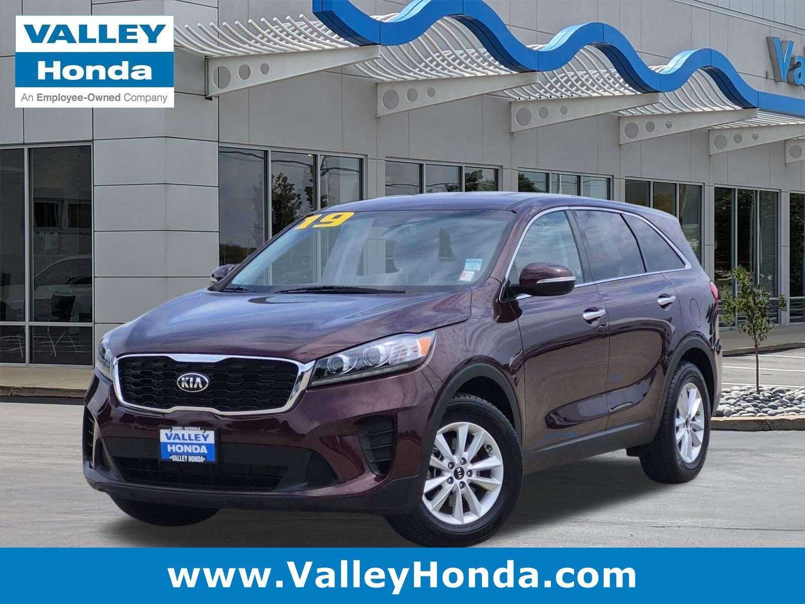 Used 2019 Sangria Kia LX image 1