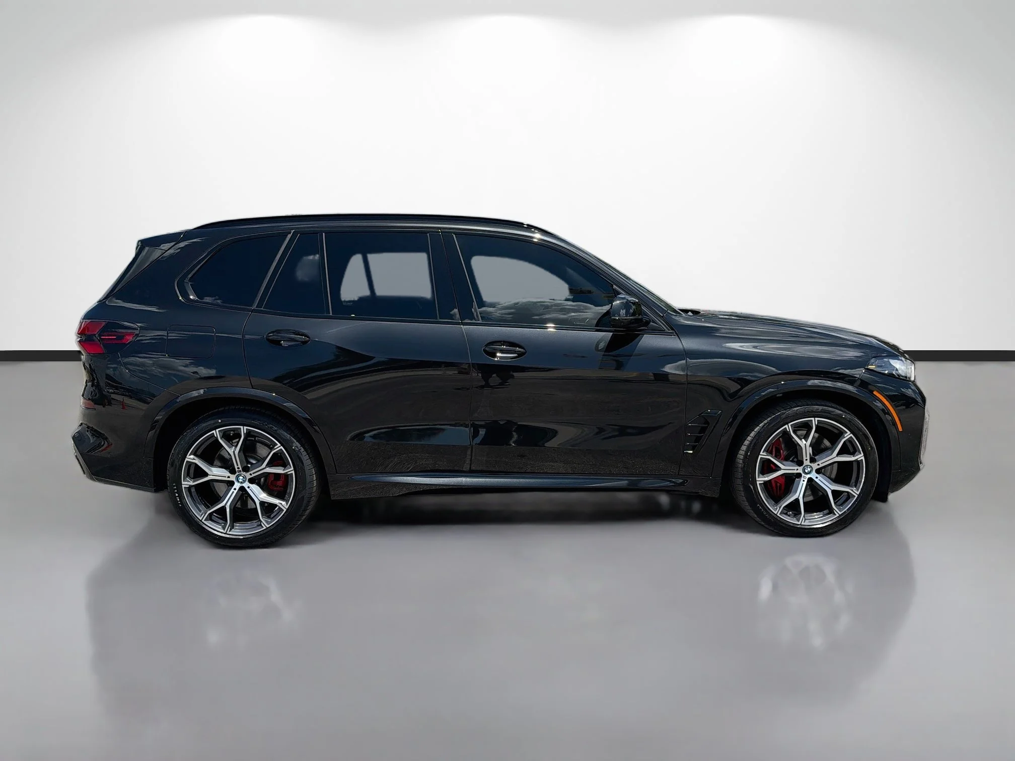 Used 2025 Black Sapphire Metallic BMW xDrive50e image 2