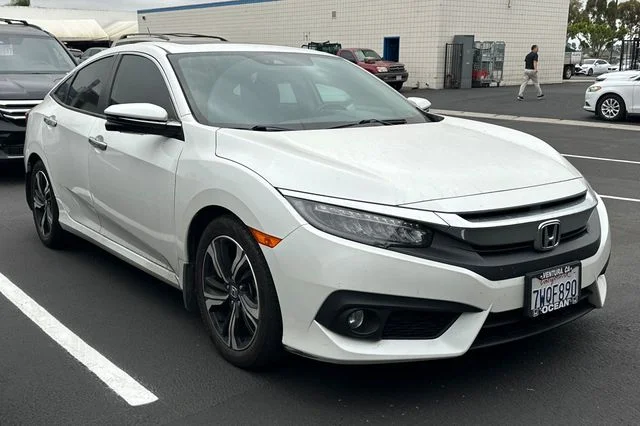Used 2017 White Orchid Pearl Honda Touring image 2