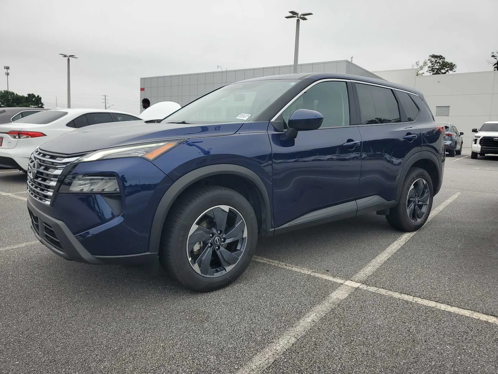 Used 2025 Deep Ocean Blue Pearl Nissan SV image 3