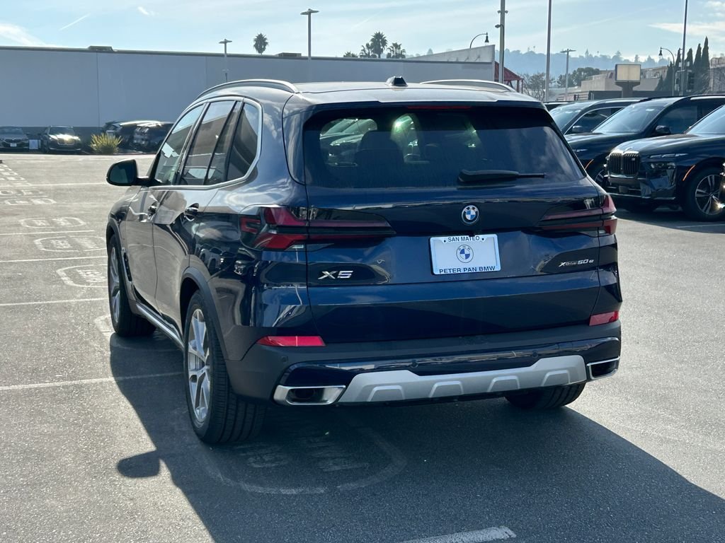 New 2026 Tanzanite Blue II Metallic BMW xDrive50e image 3