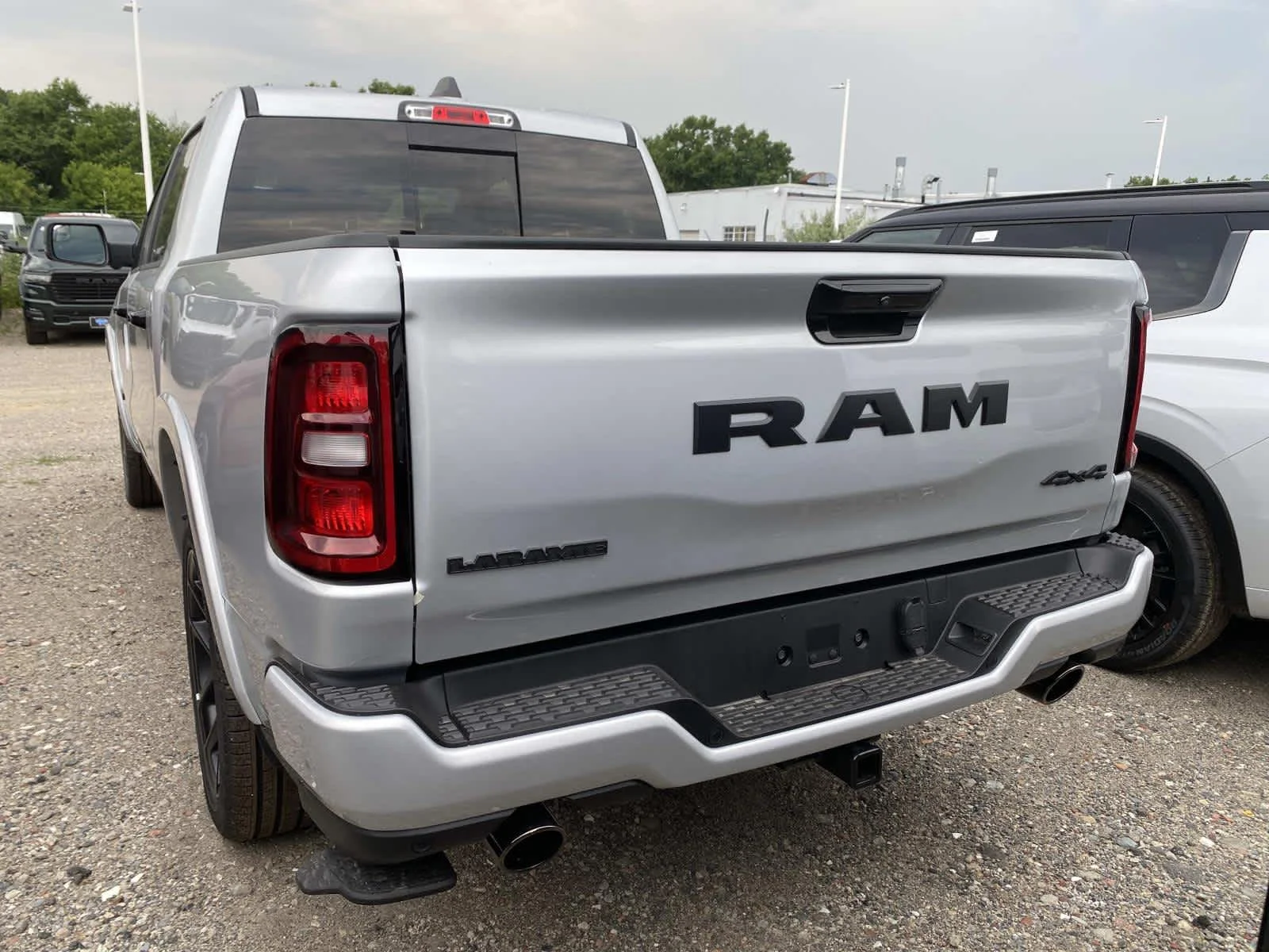 New 2026 Silver Zynith Exterior Paint RAM Laramie image 4