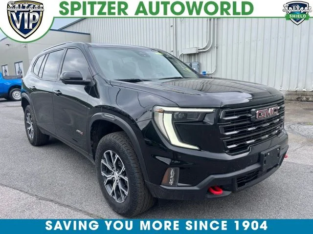 Used 2025 Ebony Twilight Metallic GMC AT4 image 1