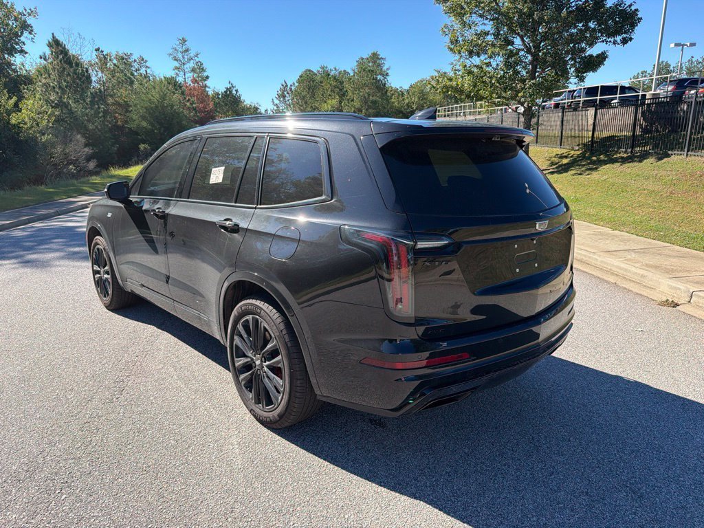 Certified Used 2024 Stellar Black Metallic Cadillac Sport image 2