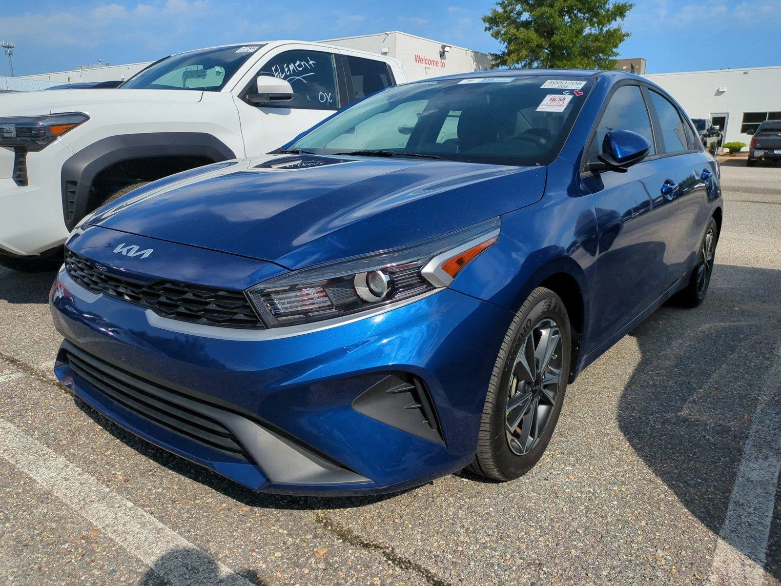 Used 2024 Deep Sea Blue Kia LXS image 6