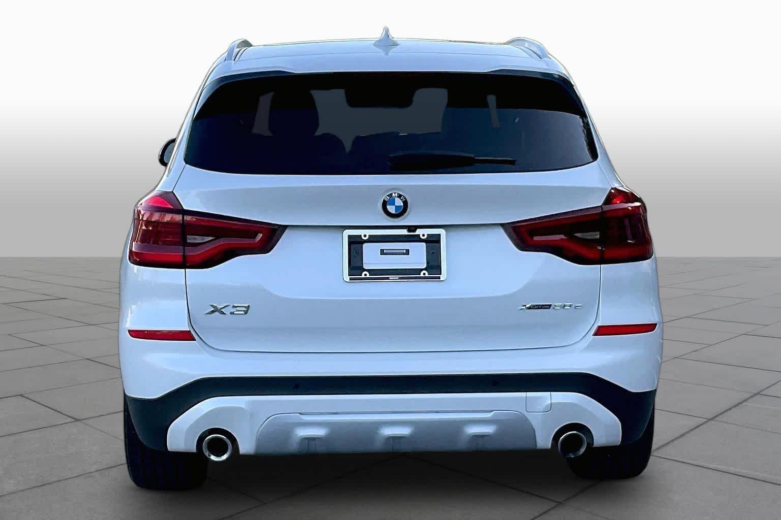 Used 2021 Mineral White Metallic BMW xDrive30e image 4