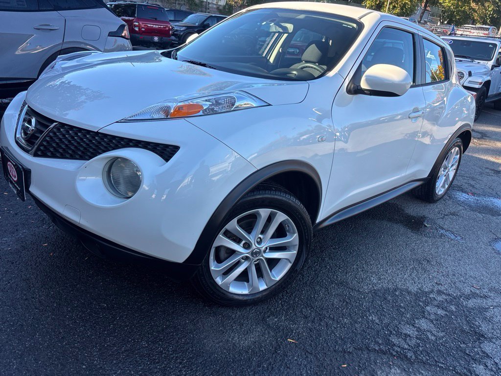 Used 2014 White Nissan S image 1