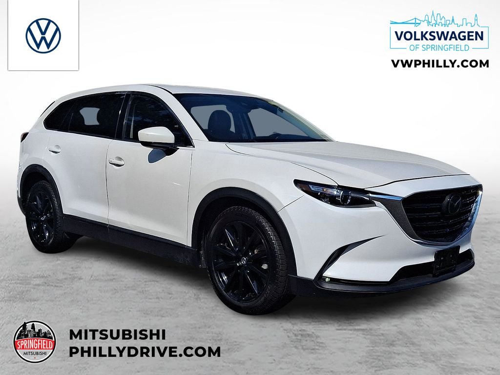 Used 2023 White Mazda Touring Plus image 1