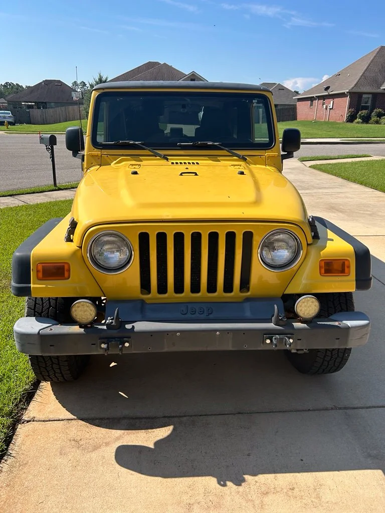 Used 2006 Yellow Jeep Unlimited Rubicon image 1