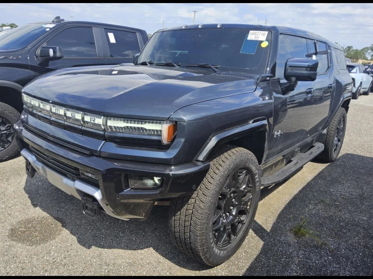 Used 2025 Graphite Blue Metallic GMC 2X image 1