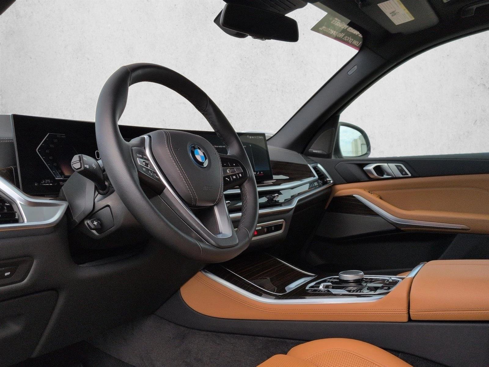 Used 2026 Mineral White Metallic BMW xDrive50e image 10