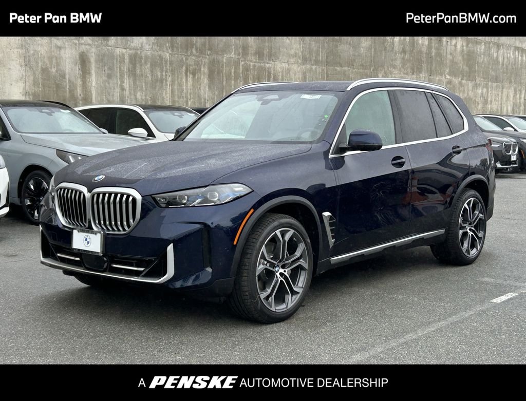 New 2026 Tanzanite Blue II Metallic BMW xDrive40i image 1