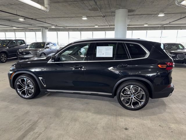 Certified Used 2026 Black Sapphire Metallic BMW xDrive50e image 6