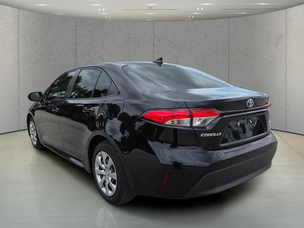 Used 2023 Midnight Black Metallic Toyota Hybrid LE image 7
