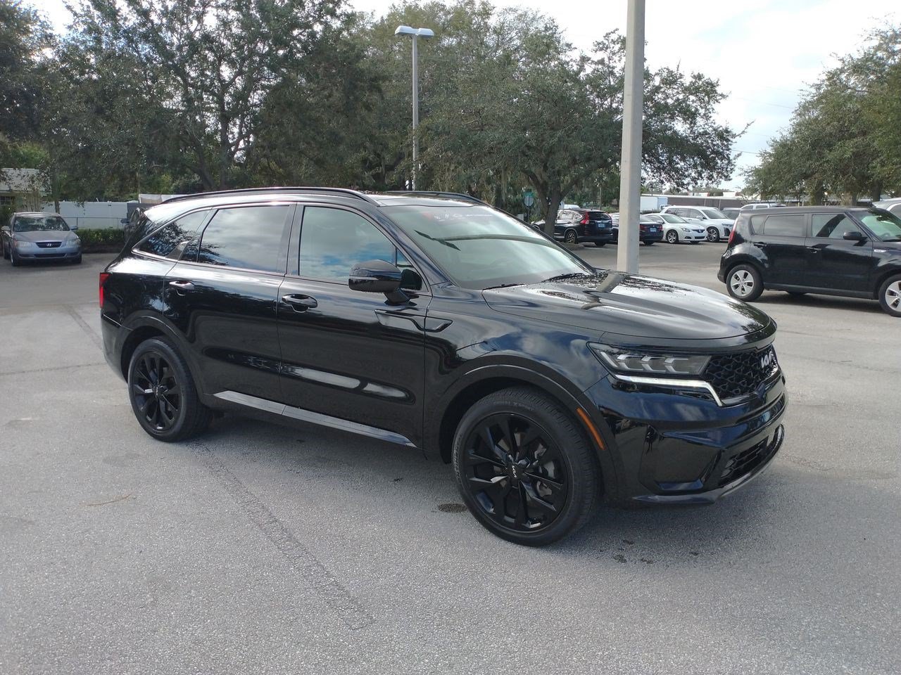 Used 2022 Ebony Black Kia SX image 1