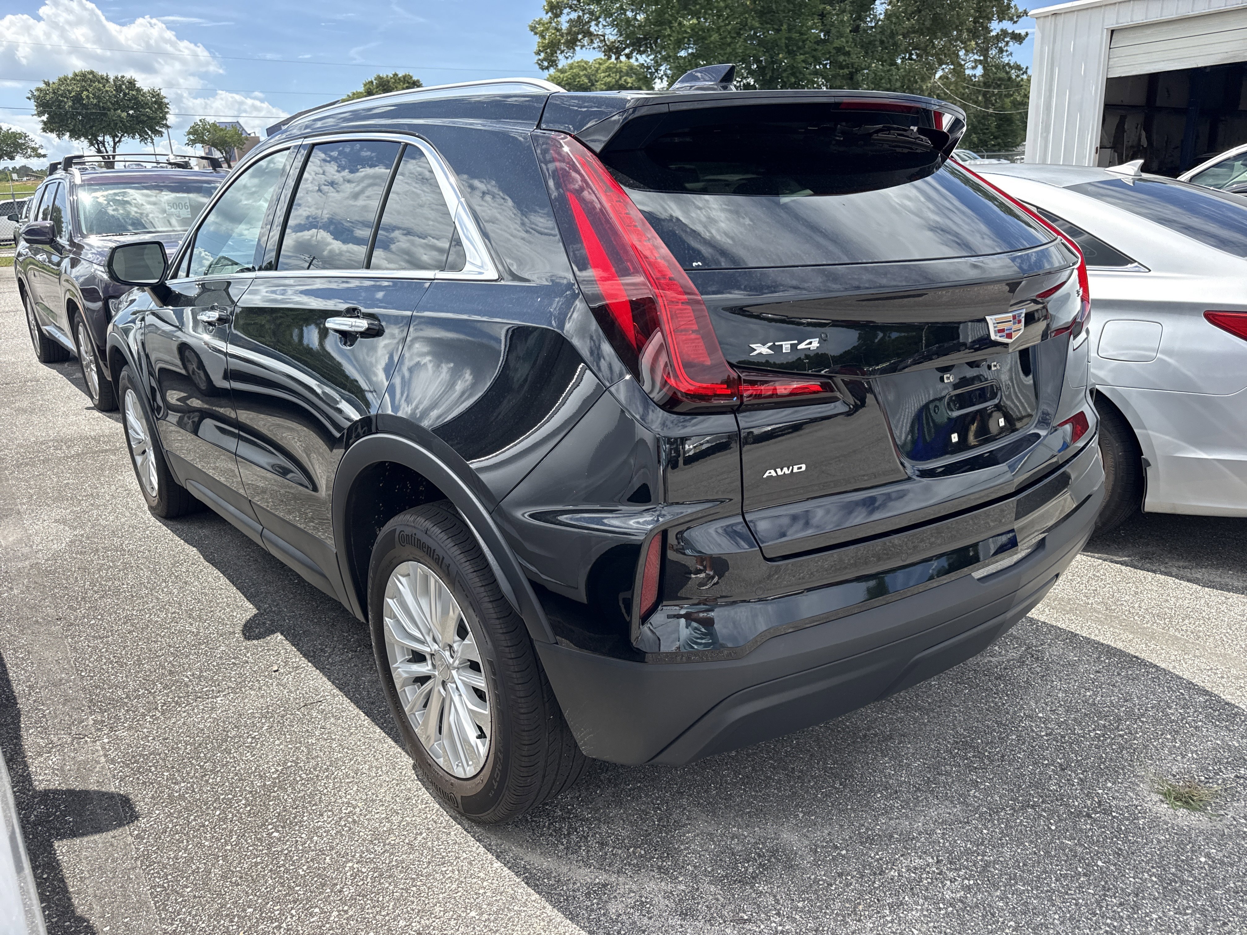 Used 2024 Stellar Black Metallic Cadillac AWD Luxury image 3